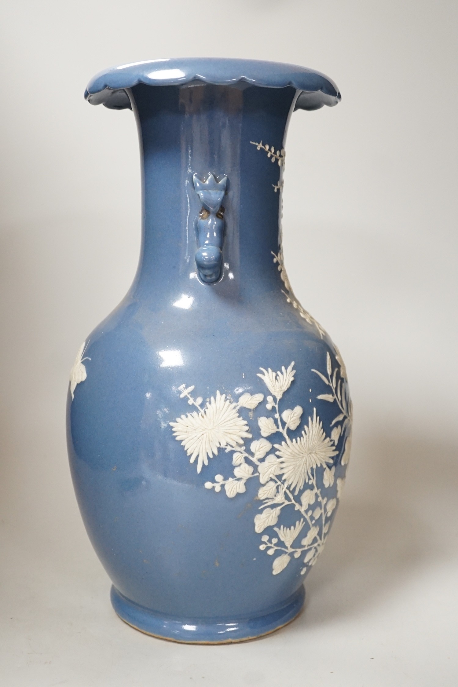 A Chinese slip-decorated blue glazed vase, 40cm